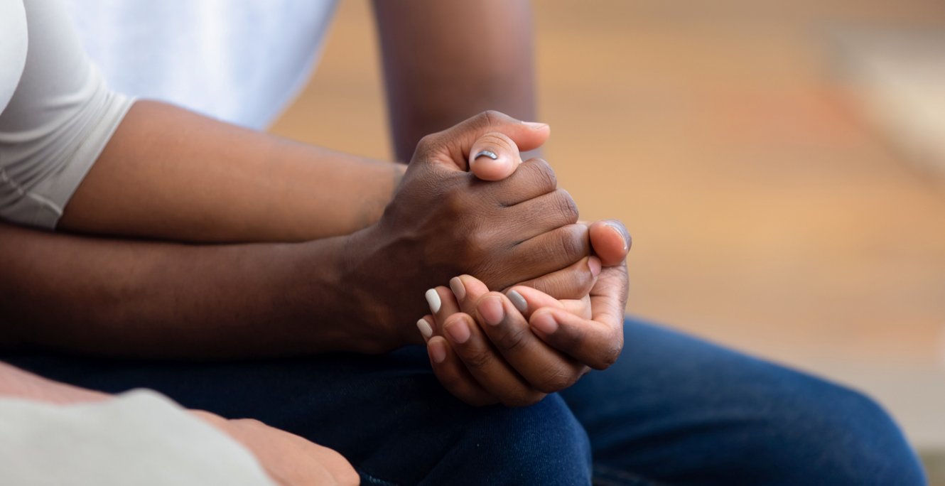 two people holding hands